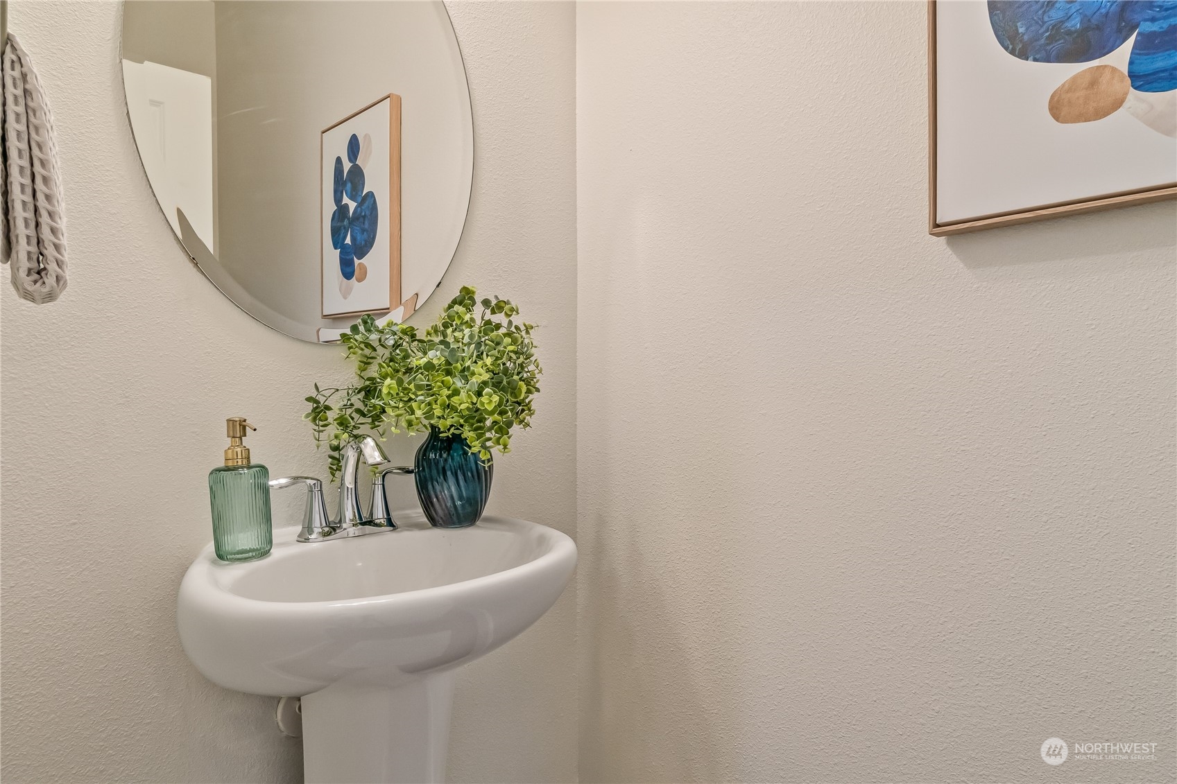 17514 39th Avenue Southeast Bothell, WA 98012 - Photo 21 of 40 a bathroom with a sink and a mirror