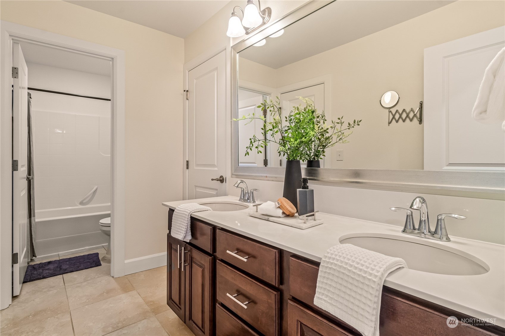 17514 39th Avenue Southeast Bothell, WA 98012 - Photo 24 of 40 a bathroom with a sink and a mirror