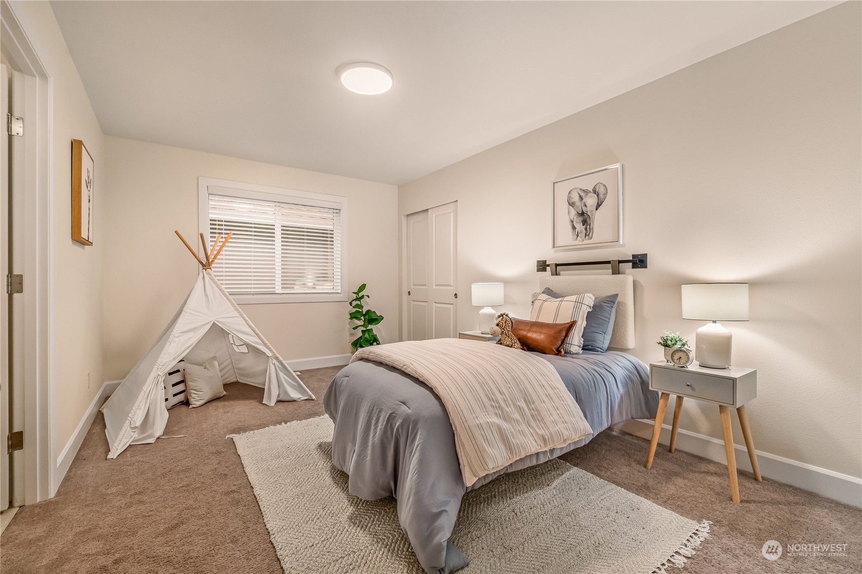 17514 39th Avenue Southeast Bothell, WA 98012 - Photo 26 of 40 a bedroom with a bed and wooden floor