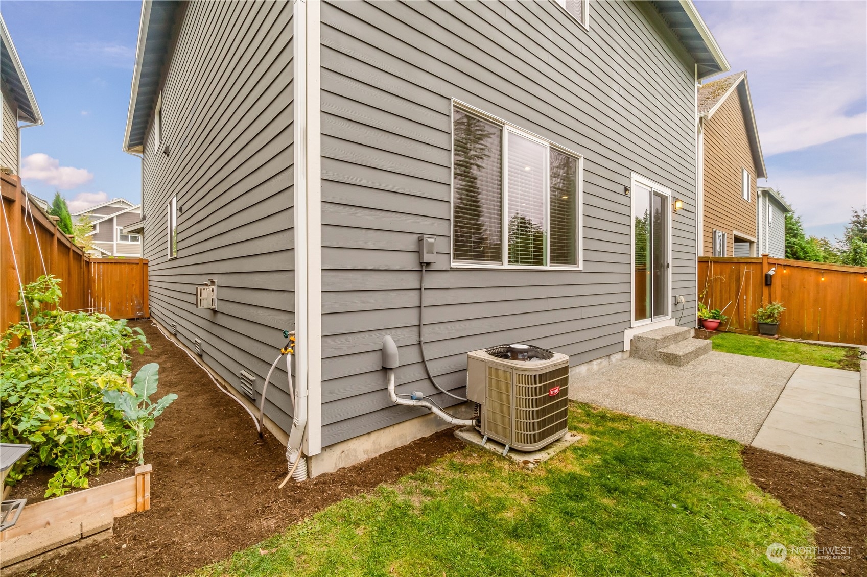 17514 39th Avenue Southeast Bothell, WA 98012 - Photo 32 of 40 a view of a chair and table in backyard
