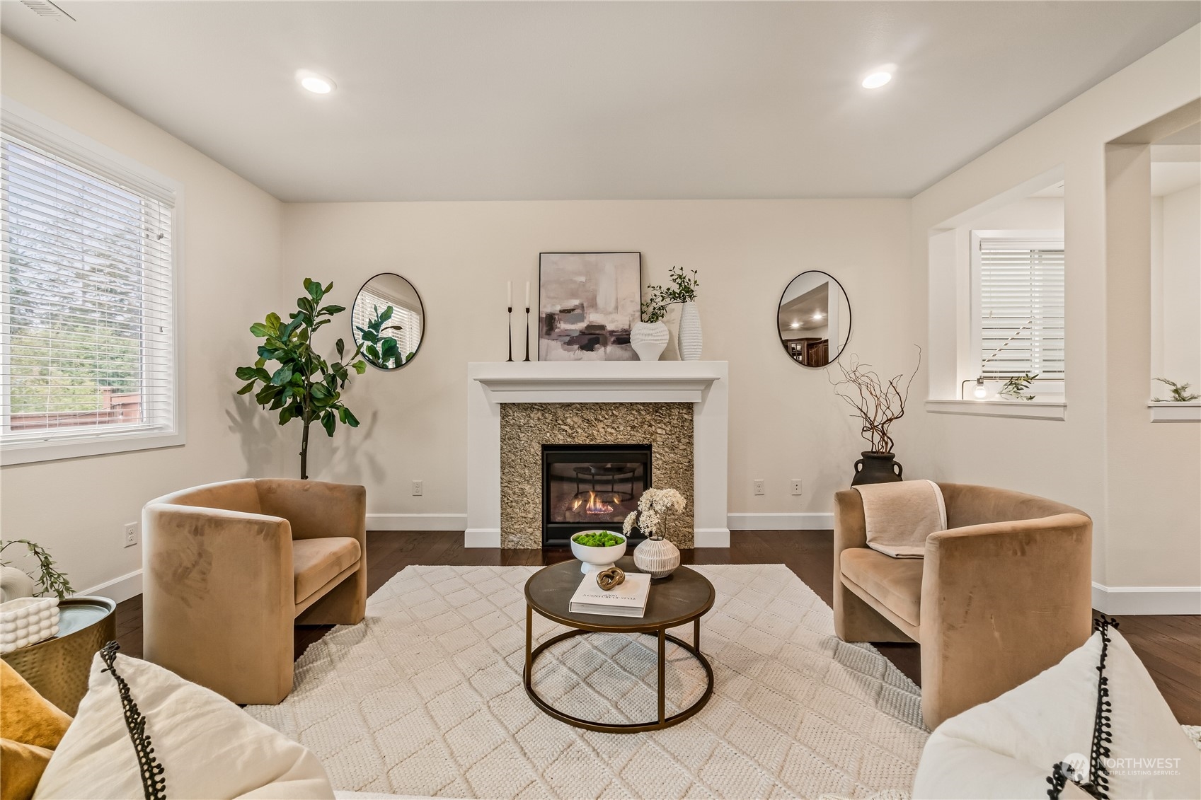 17514 39th Avenue Southeast Bothell, WA 98012 - Photo 5 of 40 a living room with furniture potted plant and a fireplace