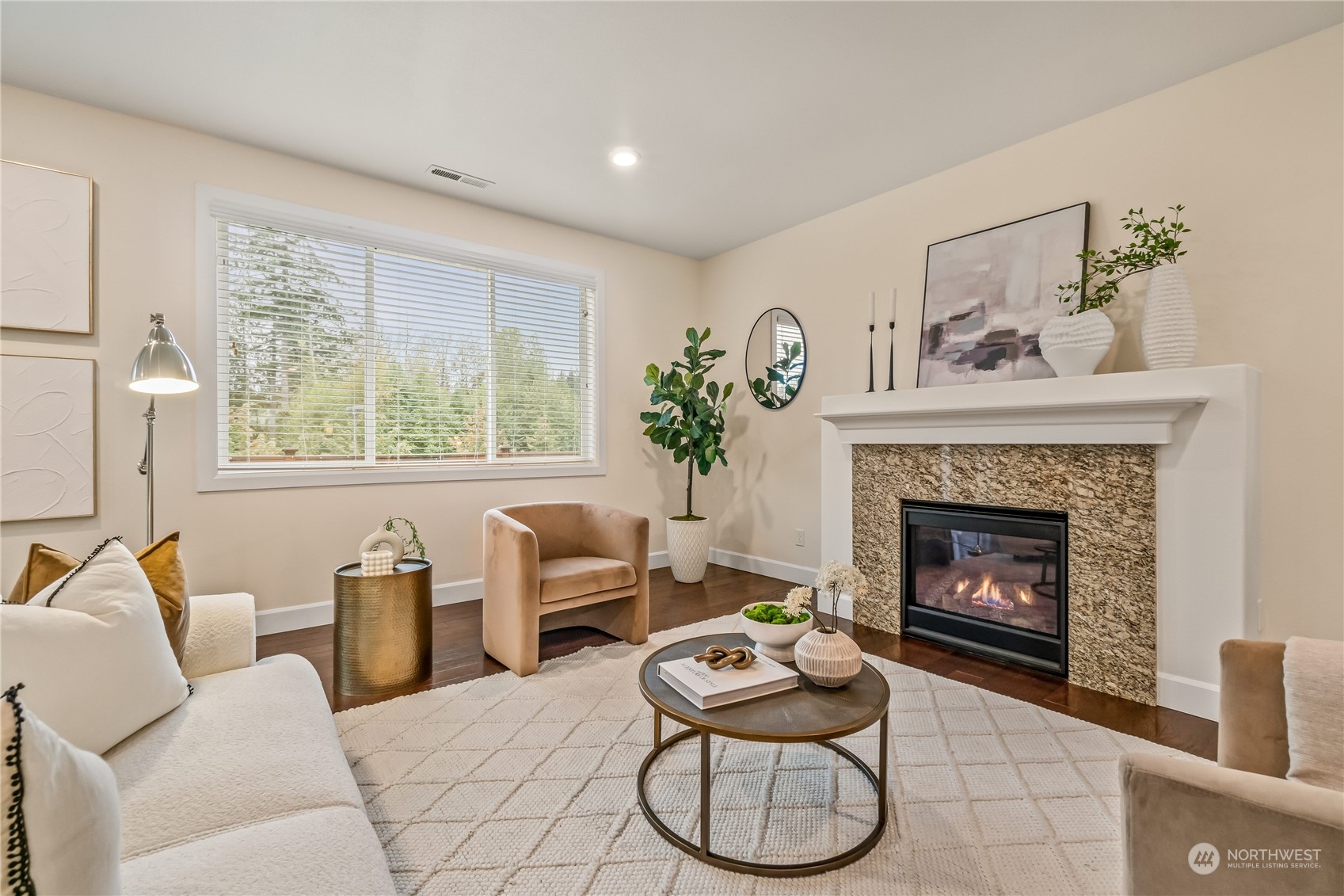 17514 39th Avenue Southeast Bothell, WA 98012 - Photo 7 of 40 a living room with furniture and a fireplace