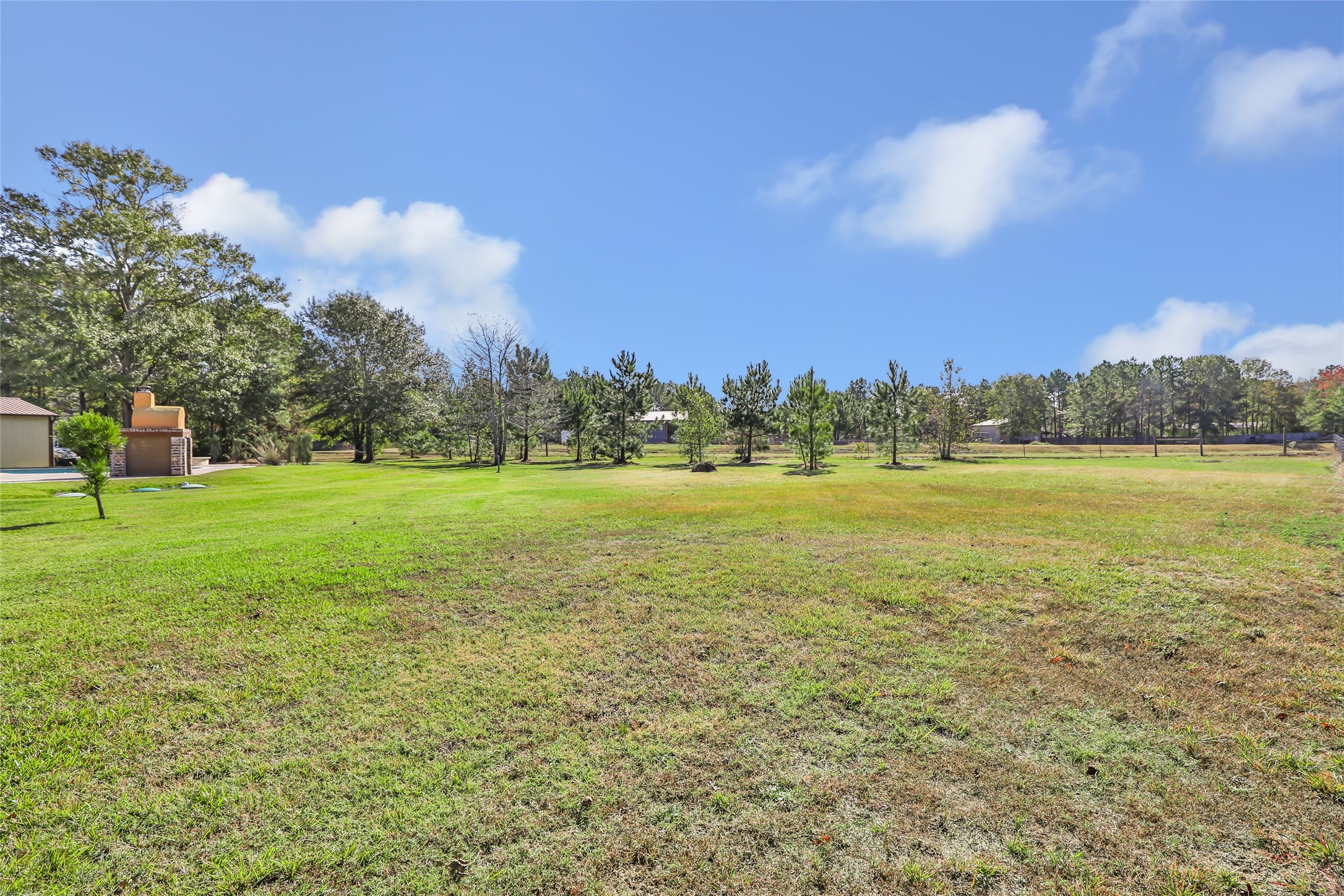 9006 Water Buck Lane Conroe, TX 77303 - Photo 20 of 48 a view of a city with tall buildings in the background