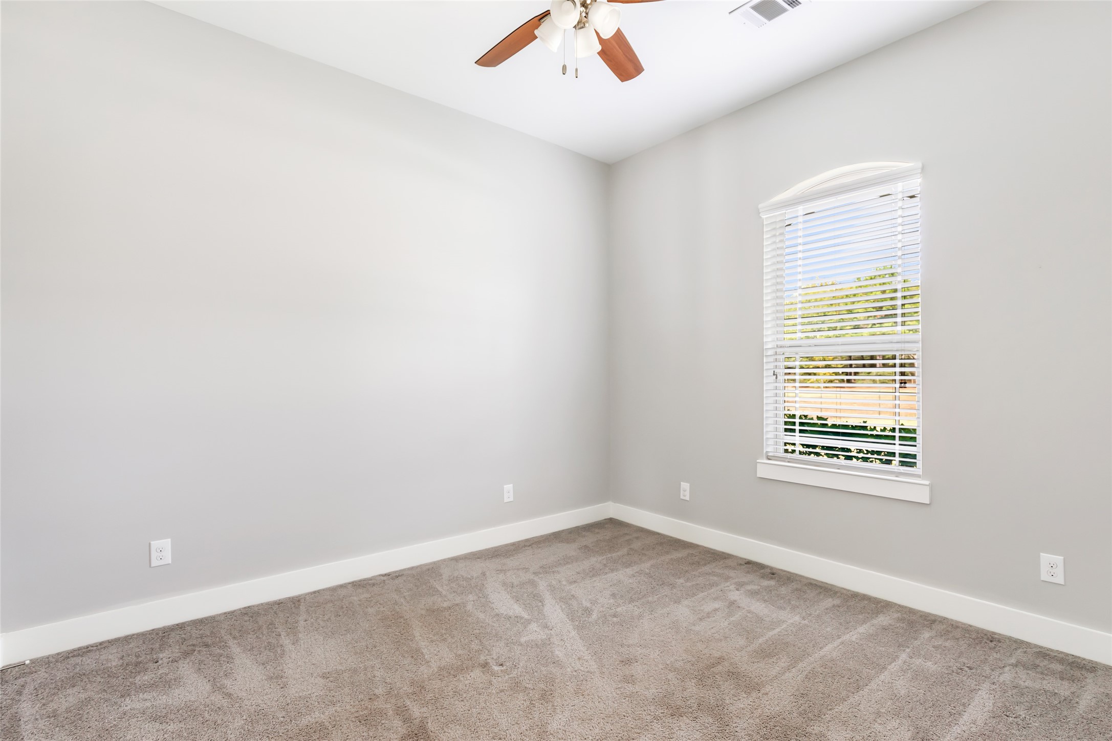 9006 Water Buck Lane Conroe, TX 77303 - Photo 46 of 48 an empty room with a window