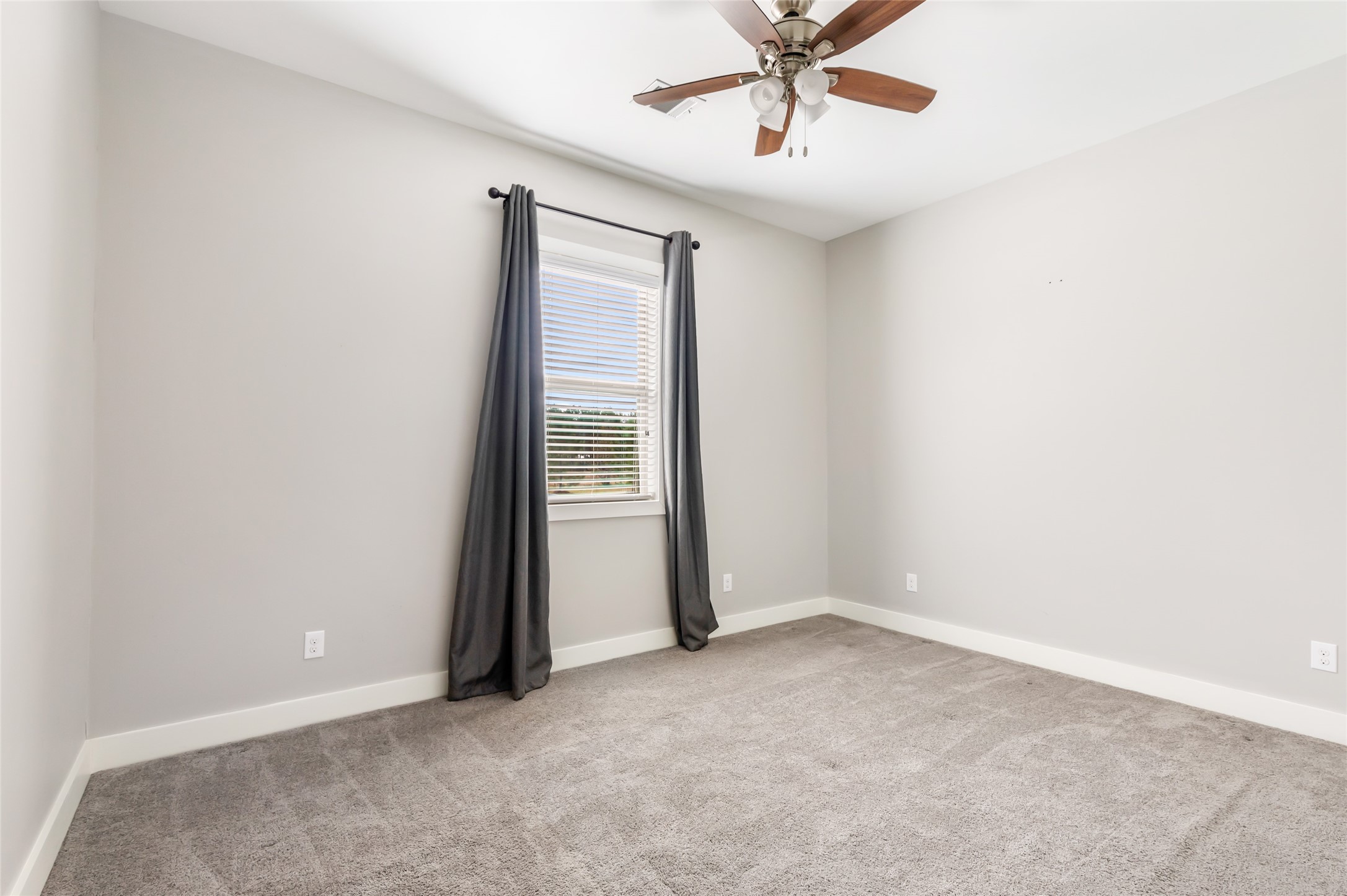 9006 Water Buck Lane Conroe, TX 77303 - Photo 48 of 48 an empty room with a view of a bathroom