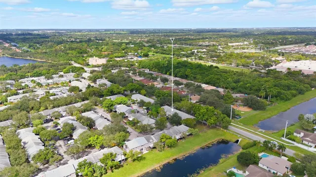 a view of swimming pool with chairs