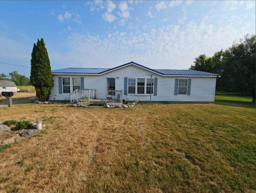 7075 East Adams Road Clare, MI 48617 - Photo 1 of 5