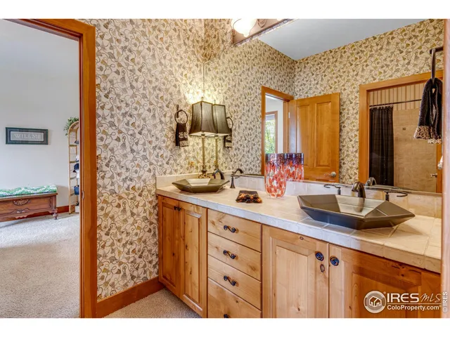 a view of a front door and wooden floor