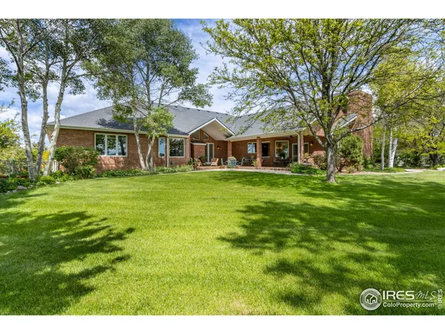 a view of a house with a big yard