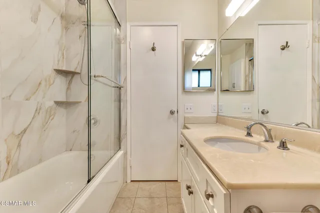 a bathroom with a sink and a tub
