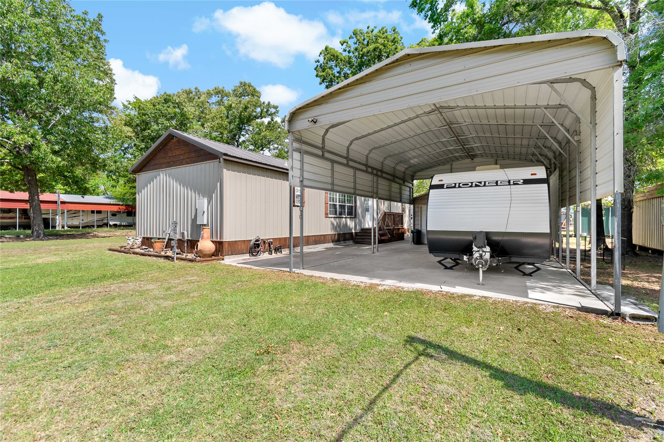 720 Cooke-Jones Road Point Blank, TX 77364 - Photo 24 of 30 High clearance carport for RV's with RV electrical hook up
