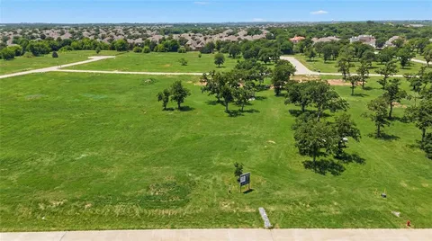 a view of a green field with lots of green space
