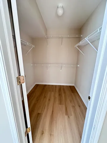 a view of wooden floor in an empty room