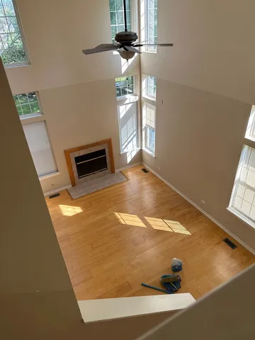 a view of a livingroom with wooden floor