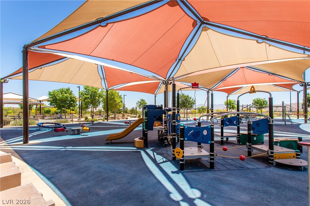7375 Campbell Ranch Avenue Las Vegas, NV 89179 - Photo 40 of 45 Kids love this outdoor playground, complete with slides and protective shade canopies.