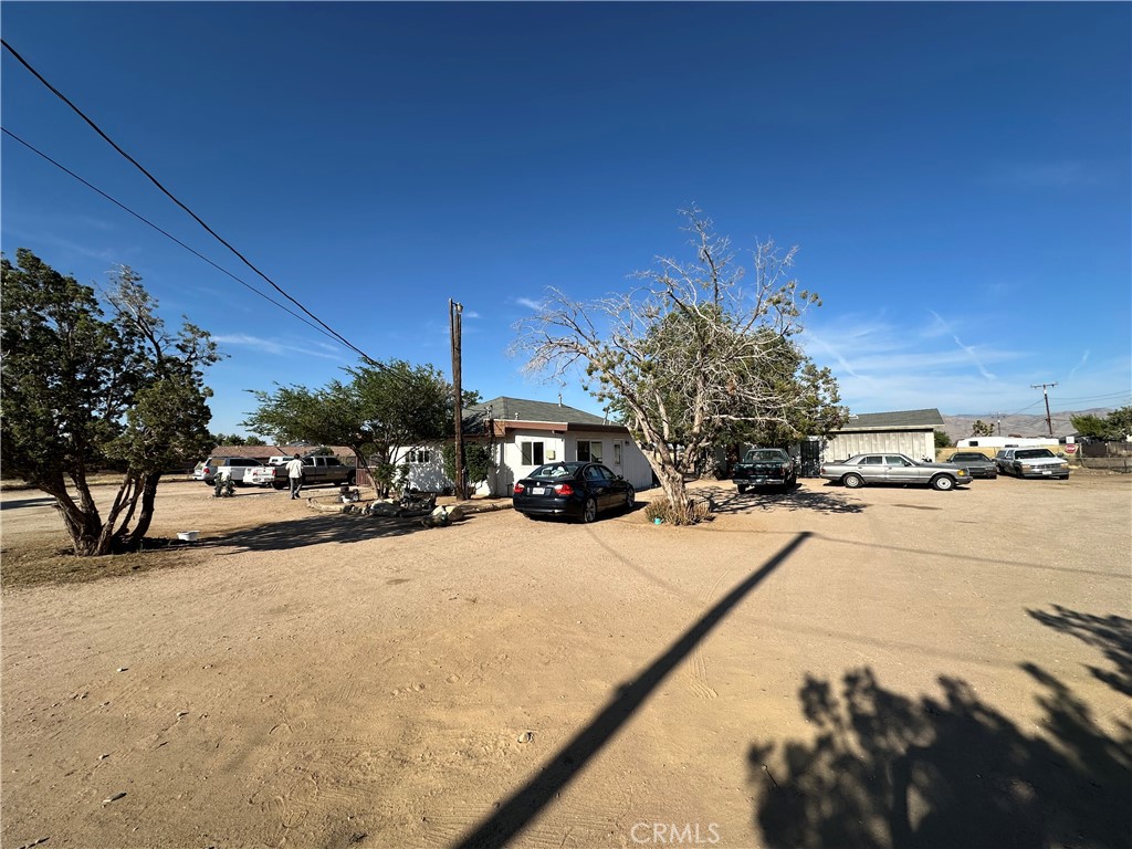 8625 C Avenue Hesperia, CA 92345 - Photo 1 of 29 a view of a street with cars