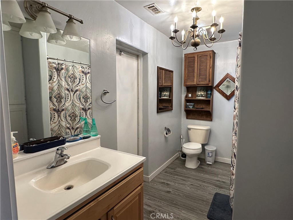 8625 C Avenue Hesperia, CA 92345 - Photo 12 of 29 a bathroom with a sink toilet and shower
