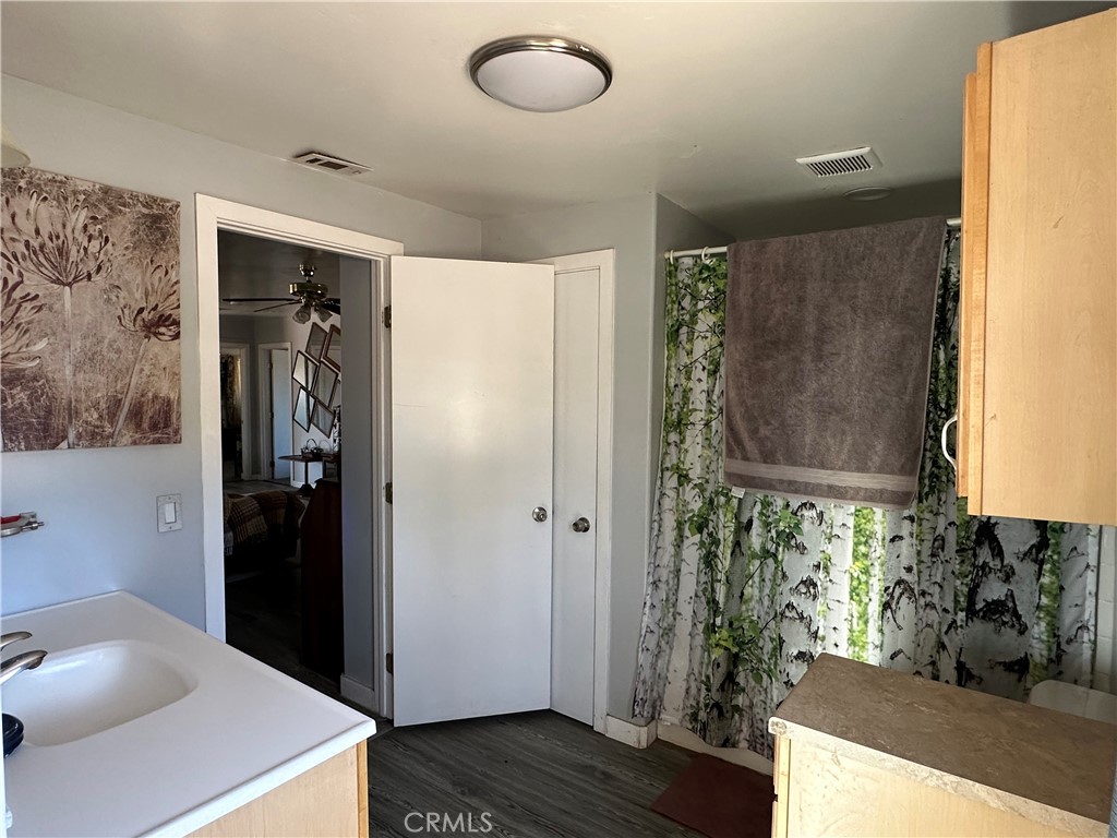 8625 C Avenue Hesperia, CA 92345 - Photo 15 of 29 a bathroom with a sink and a mirror