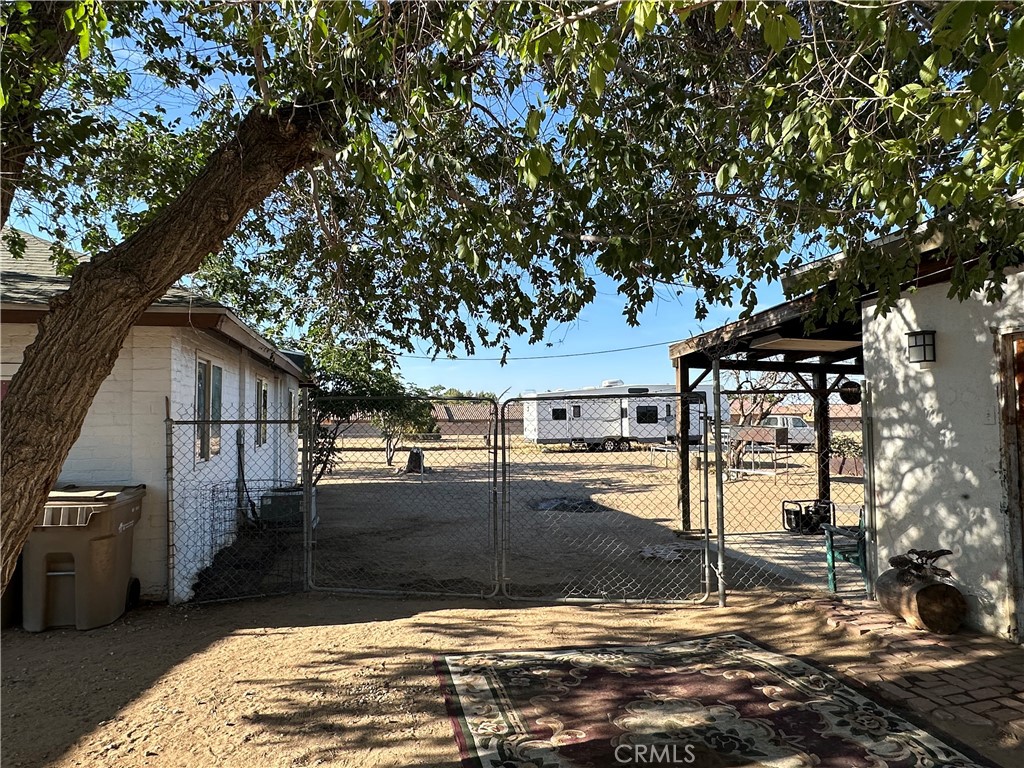 8625 C Avenue Hesperia, CA 92345 - Photo 21 of 29 a view of a backyard of the house