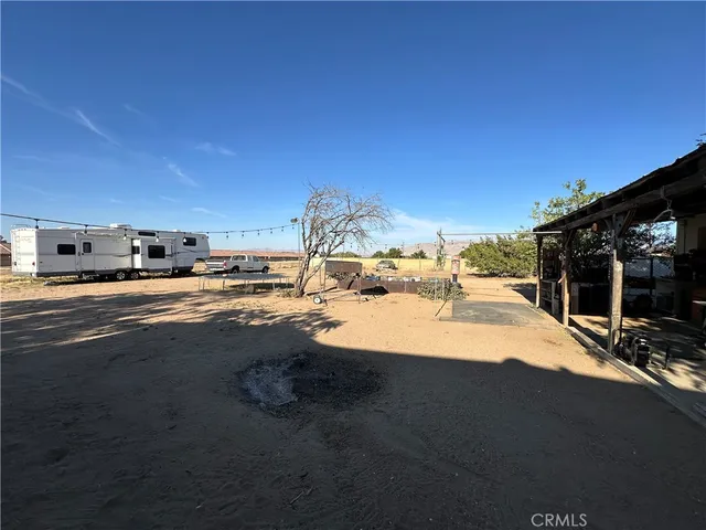a view of patio with swimming pool