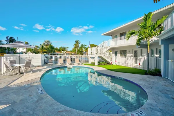 a view of a house with a swimming pool