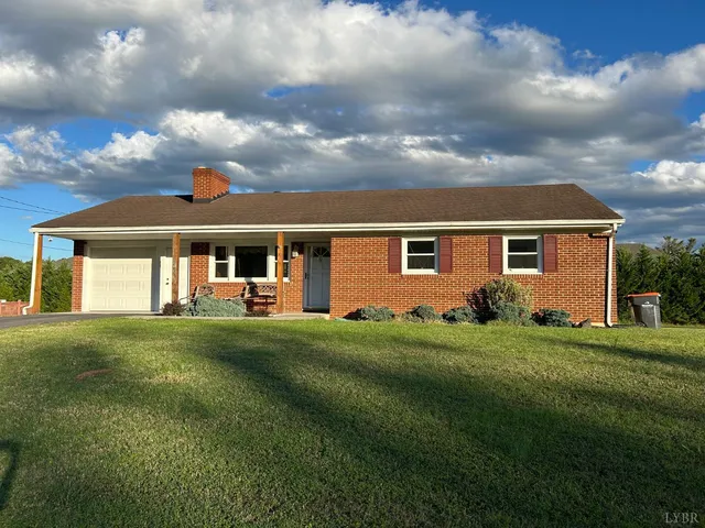 front view of a house with a garden