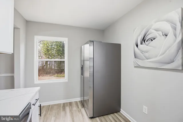 a view of livingroom with furniture and wooden floor
