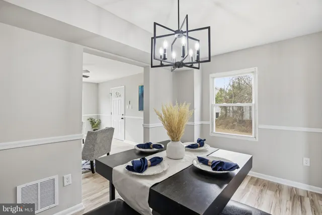 a living room with furniture and window