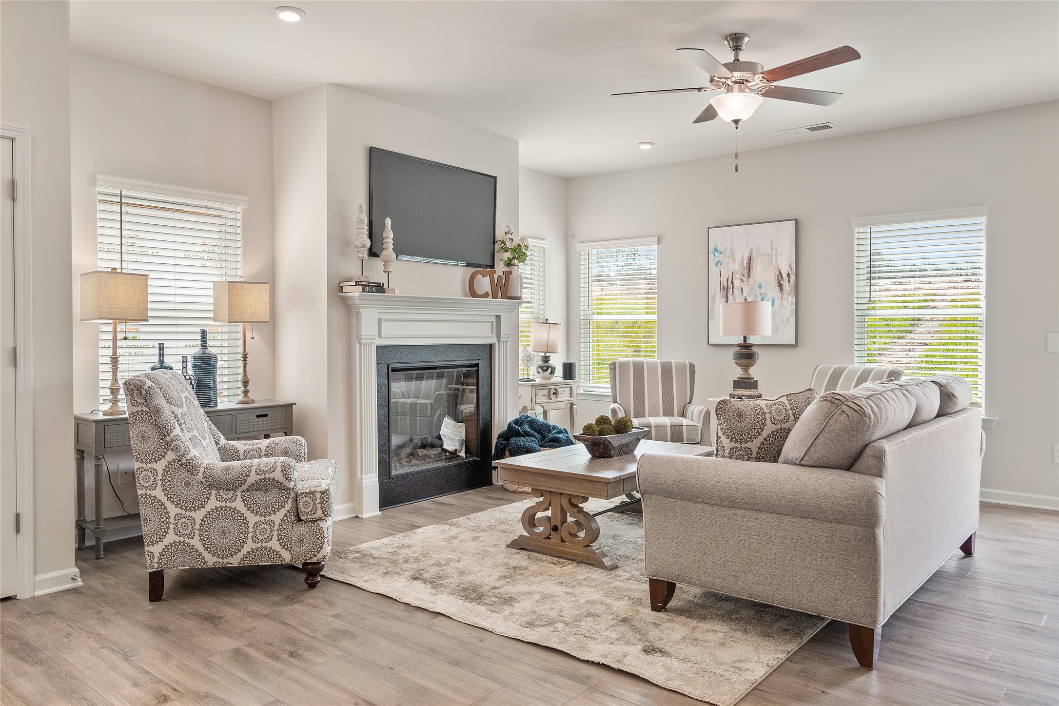 9722 Enclave Ridge Road Willis, TX 77318 - Photo 11 of 20 a living room with furniture and a fireplace