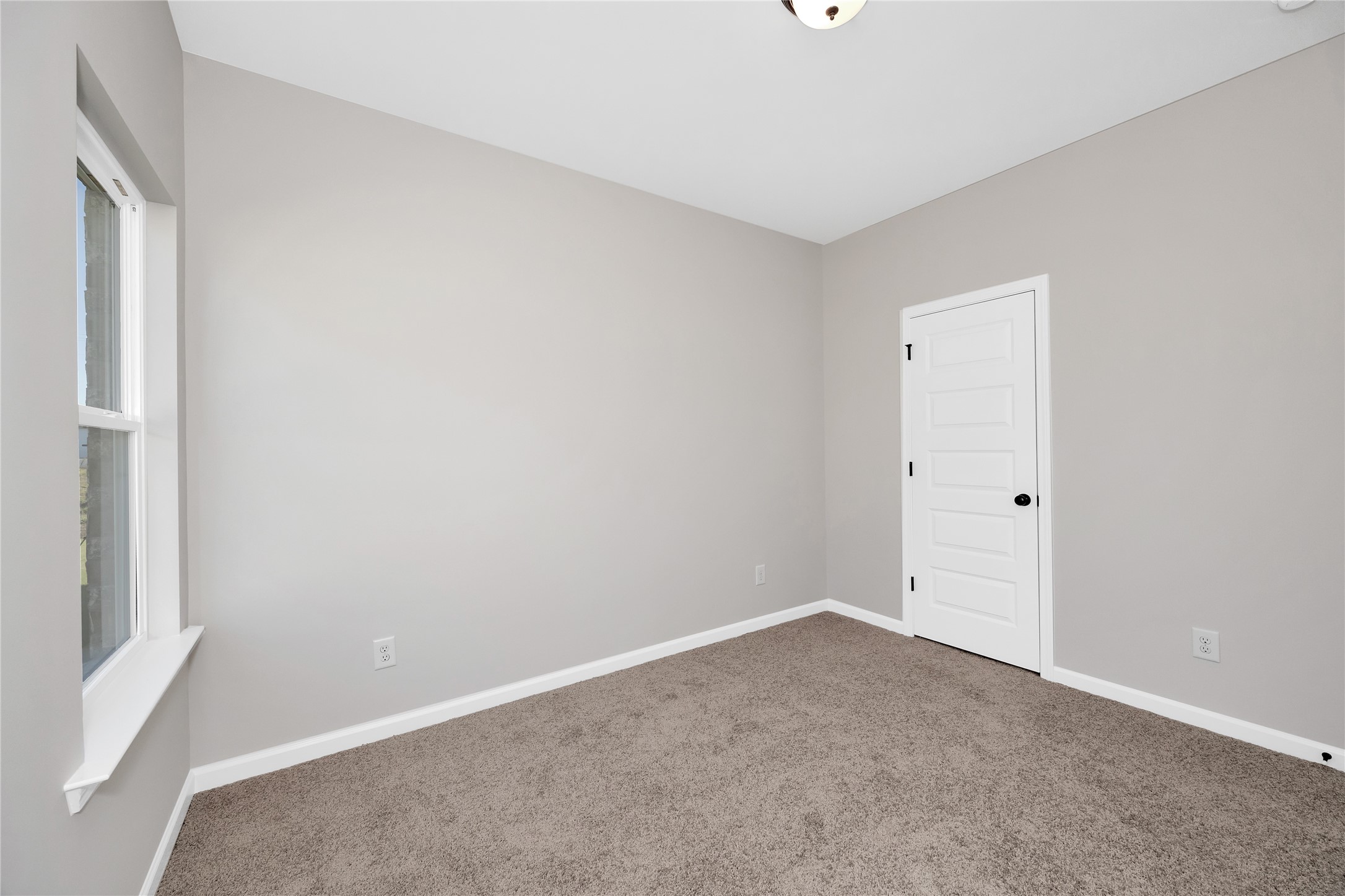 9722 Enclave Ridge Road Willis, TX 77318 - Photo 18 of 20 a view of an empty room