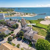 an aerial view of a houses with outdoor space