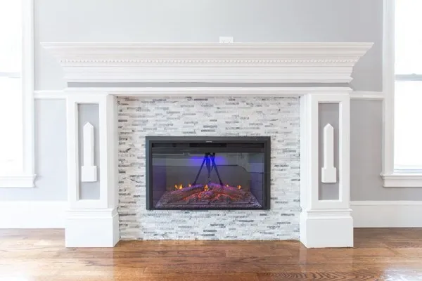 a living room with a fireplace