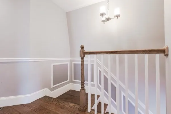 a view of staircase with white walls