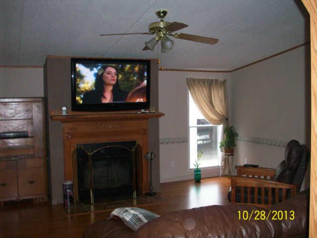 192 Pioneer Road Hohenwald, TN 38462 - Photo 4 of 13 LIVING ROOM WITH FIREPLACE