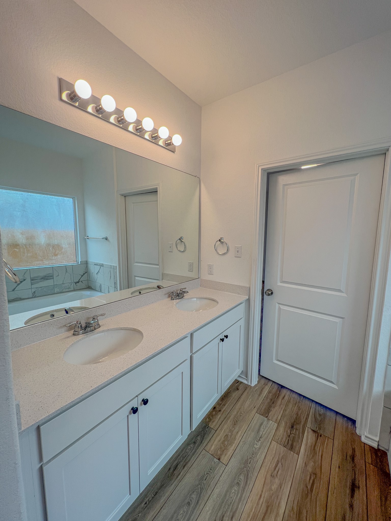 438 Perfect World Loop Jarrell, TX 76537 - Photo 14 of 35 a bathroom with a sink and a mirror