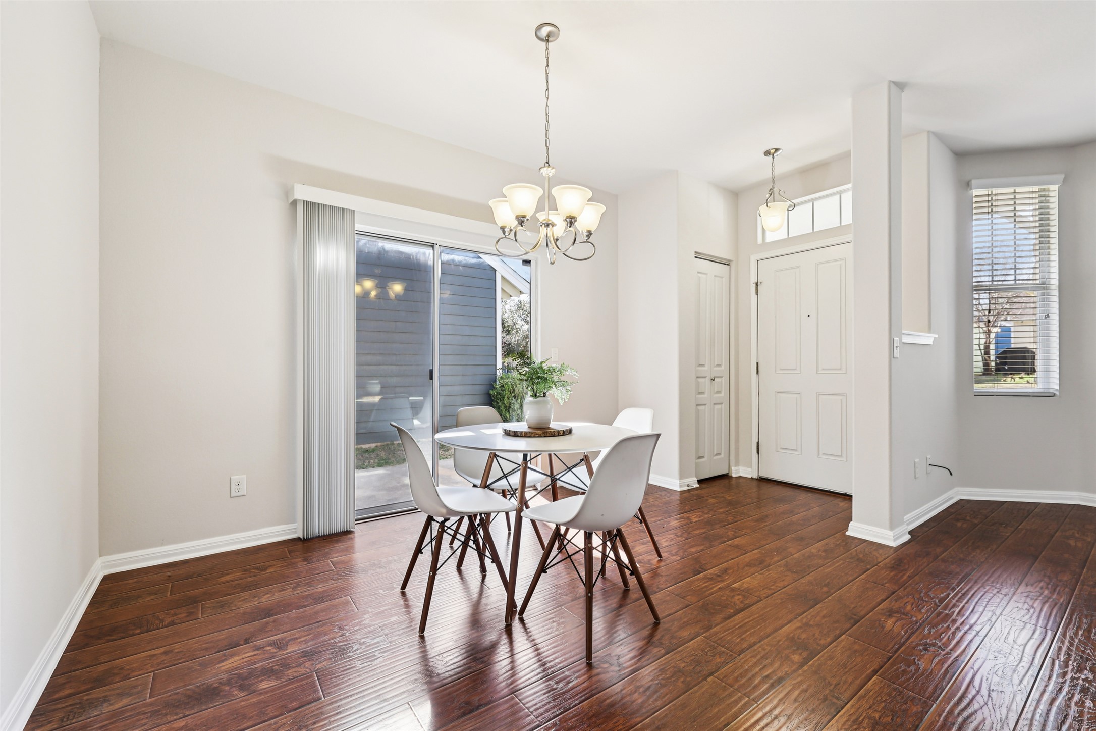 1524 Sanders Kyle, TX 78640 - Photo 10 of 37 a view of a dining room with furniture and wooden floor