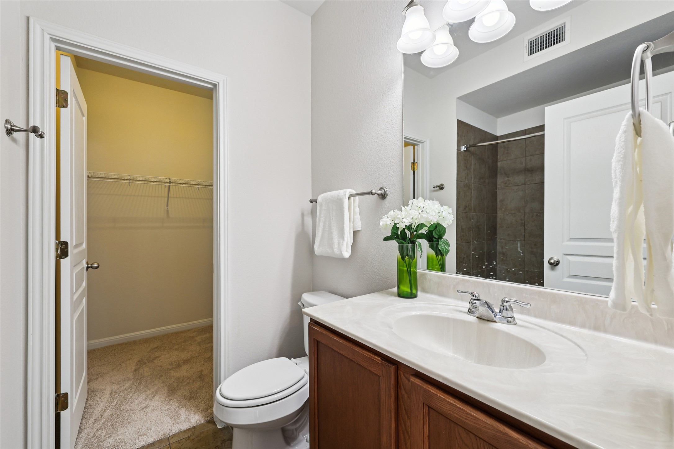 1524 Sanders Kyle, TX 78640 - Photo 18 of 37 a bathroom with a granite countertop sink toilet and shower