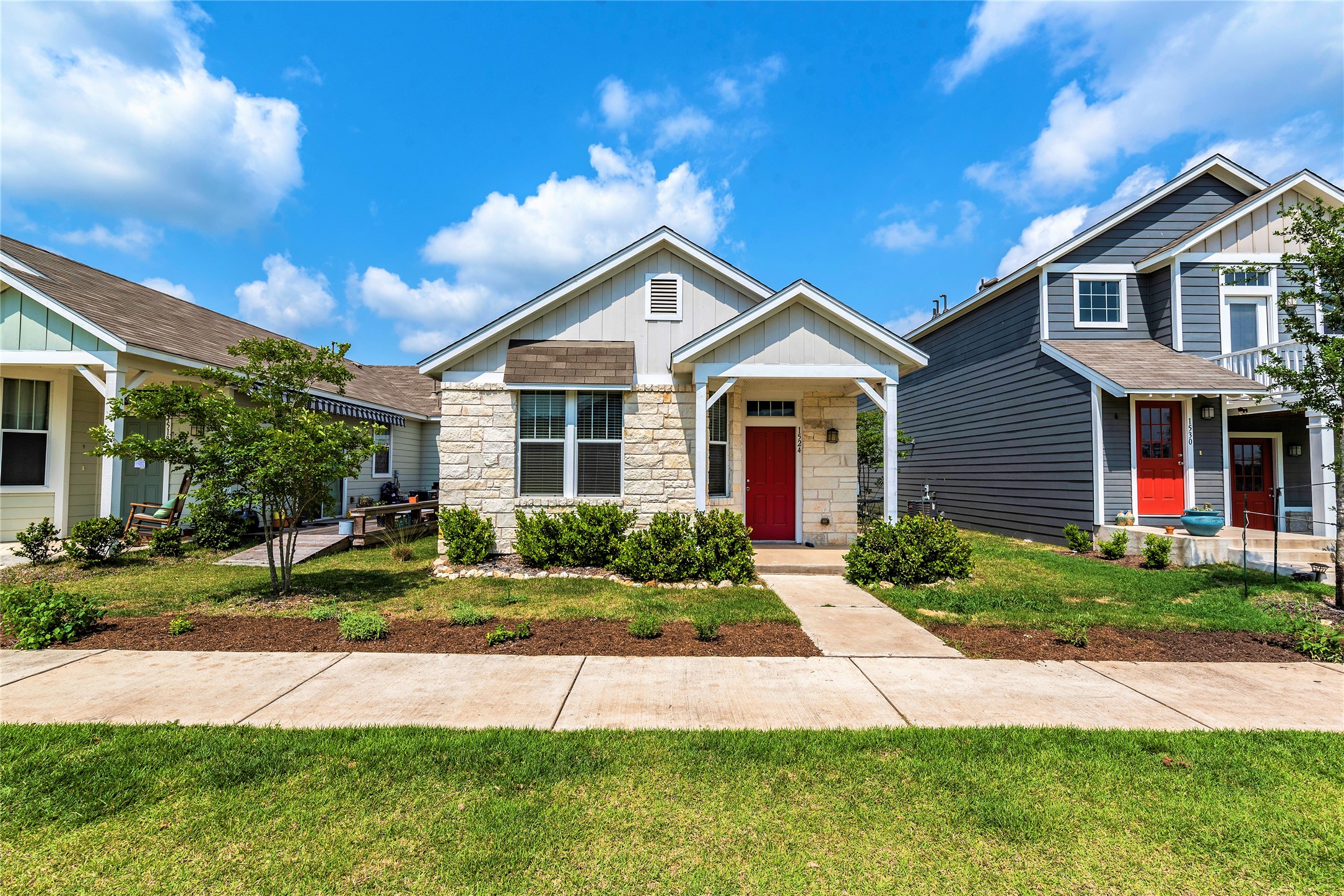 1524 Sanders Kyle, TX 78640 - Photo 2 of 37 a front view of a house with a yard