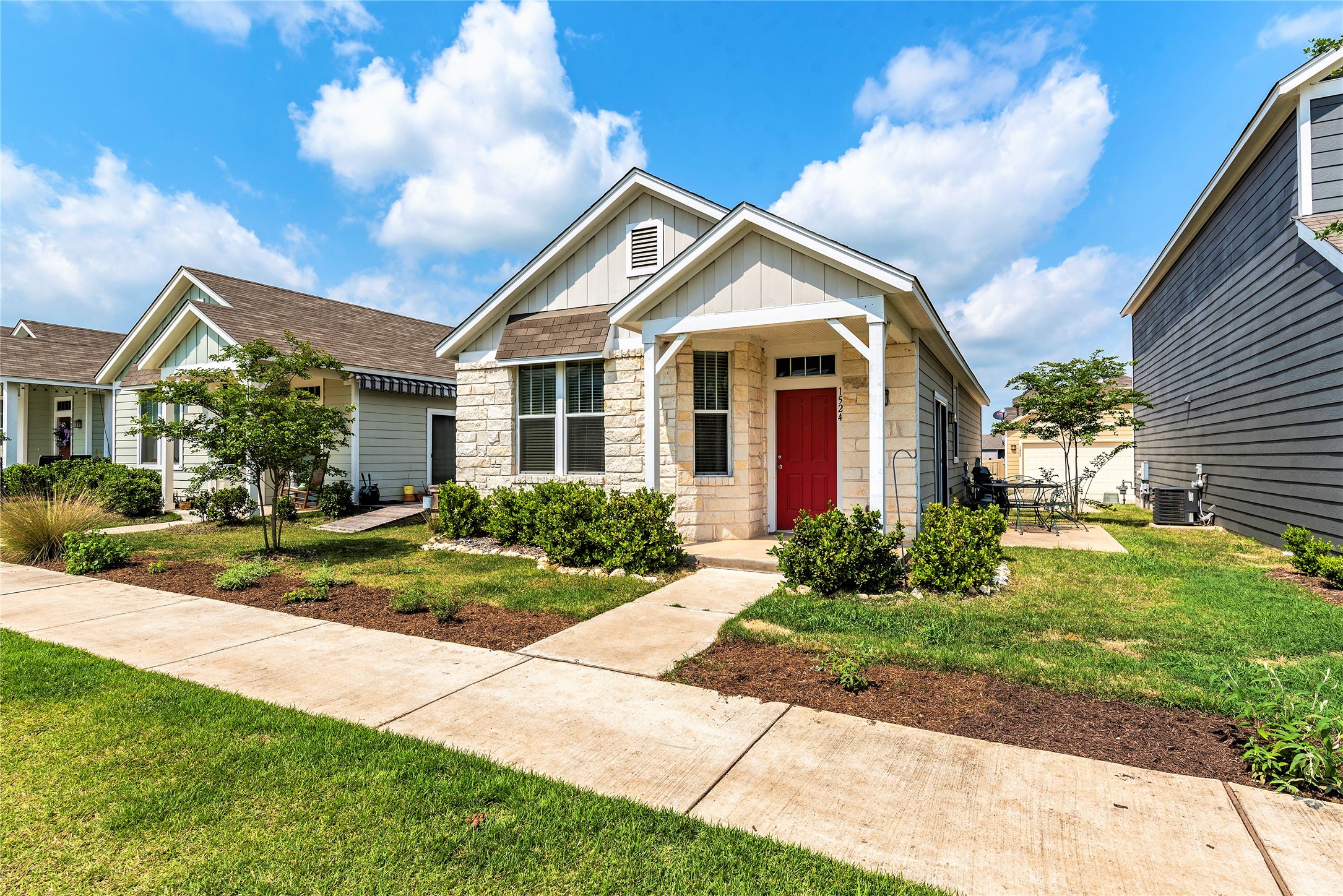 1524 Sanders Kyle, TX 78640 - Photo 36 of 37 a front view of a house with a yard