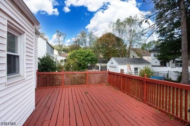 a view of balcony with wooden floor