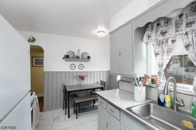 a room with furniture and a sink