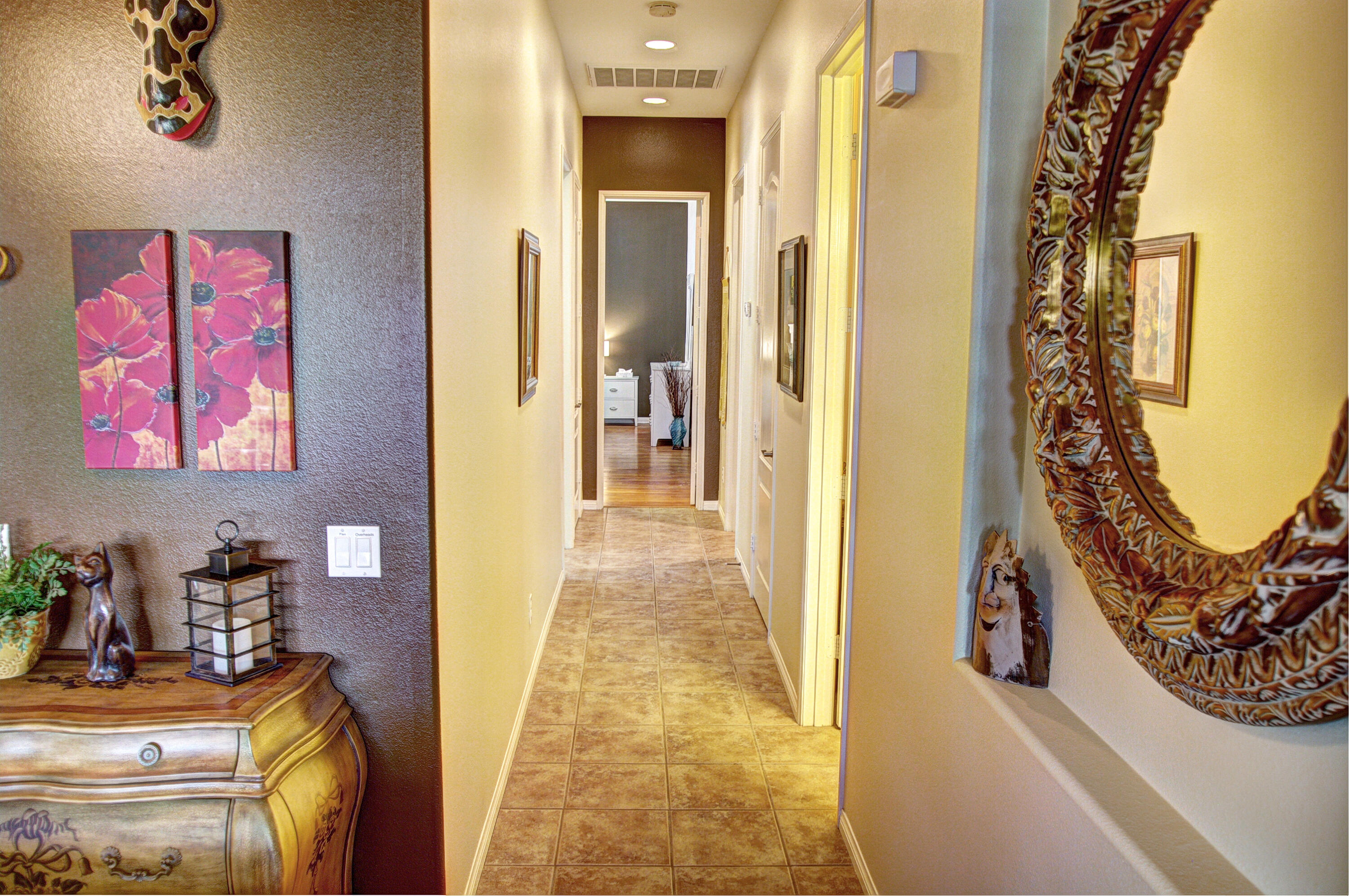 82799 Burnette Drive Indio, CA 92201 - Photo 15 of 36 a view of a hallway to a livingroom with furniture