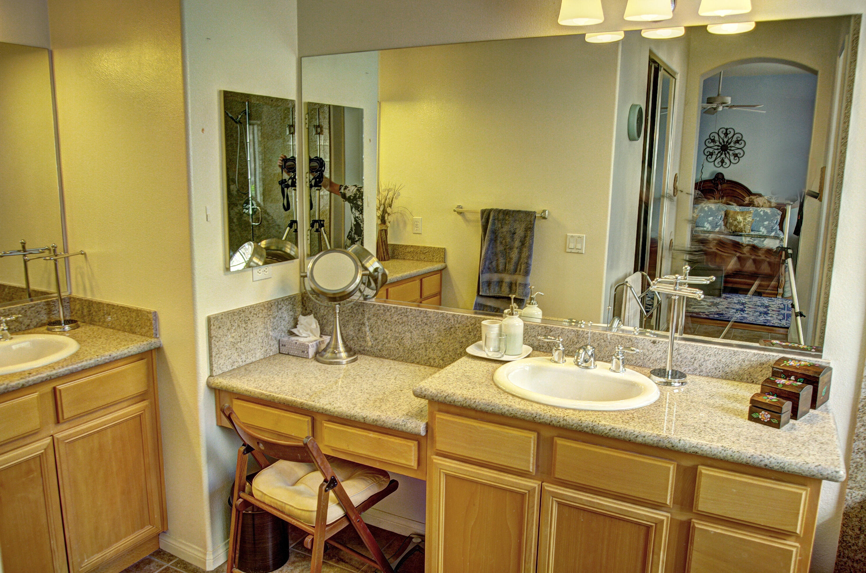 82799 Burnette Drive Indio, CA 92201 - Photo 21 of 36 a bathroom with a sink and a mirror