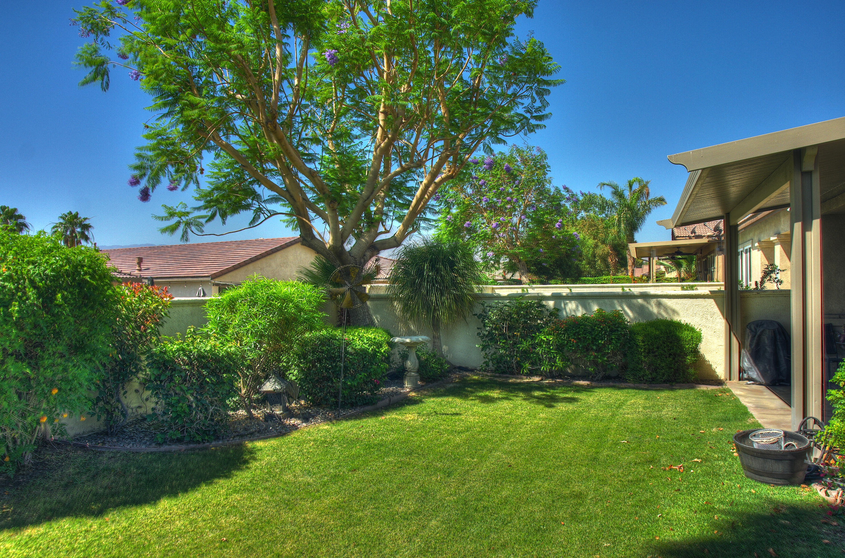 82799 Burnette Drive Indio, CA 92201 - Photo 32 of 36 a view of a backyard