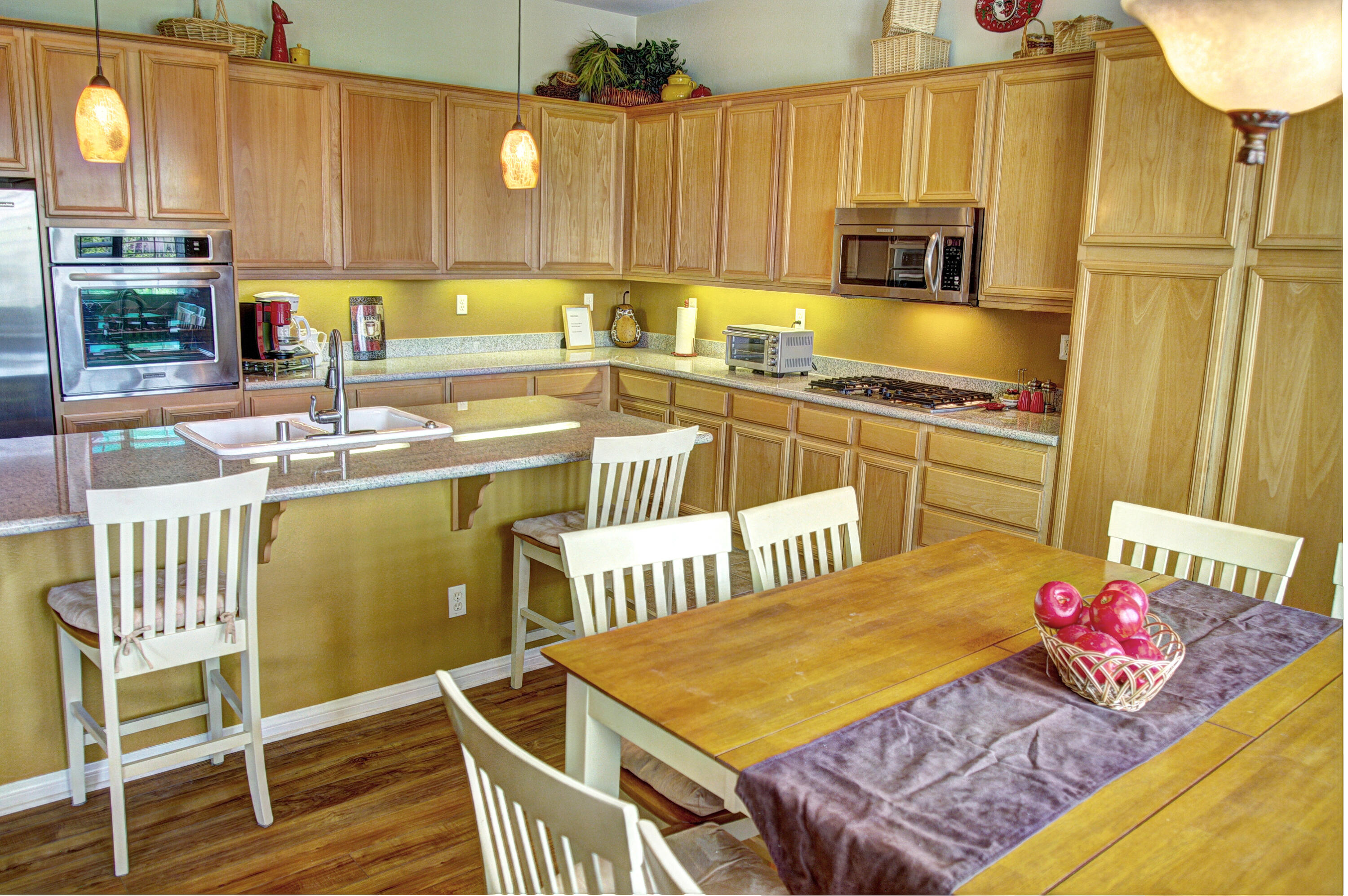 82799 Burnette Drive Indio, CA 92201 - Photo 5 of 36 a kitchen with a sink and cabinets