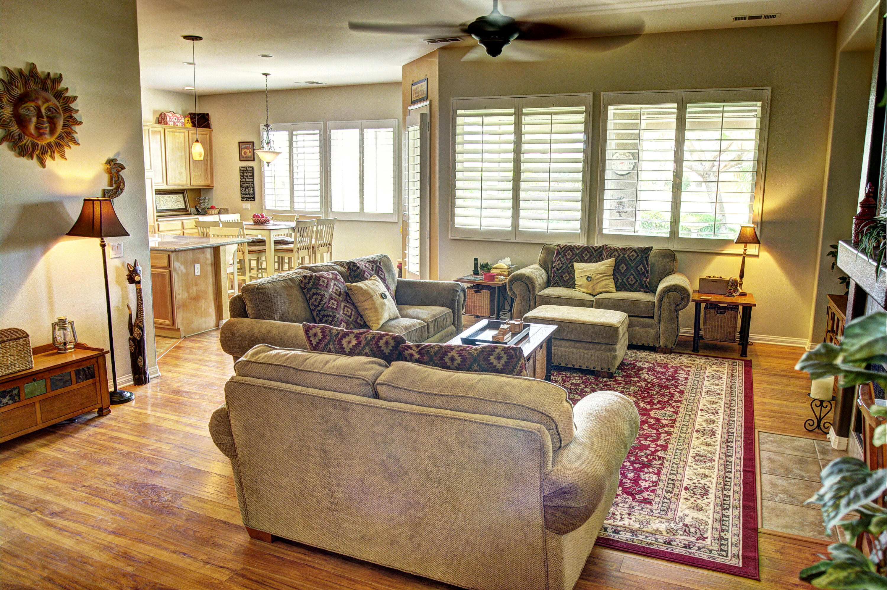 82799 Burnette Drive Indio, CA 92201 - Photo 9 of 36 a living room with furniture and a large window