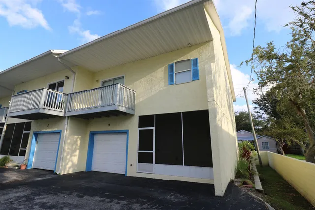 a swimming pool with outdoor seating