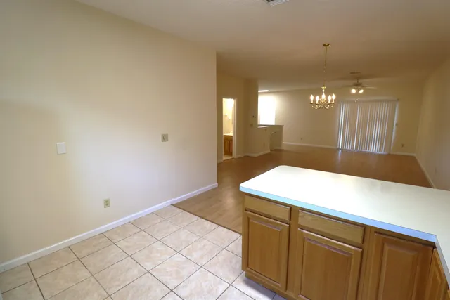 a room with a sink and a mirror