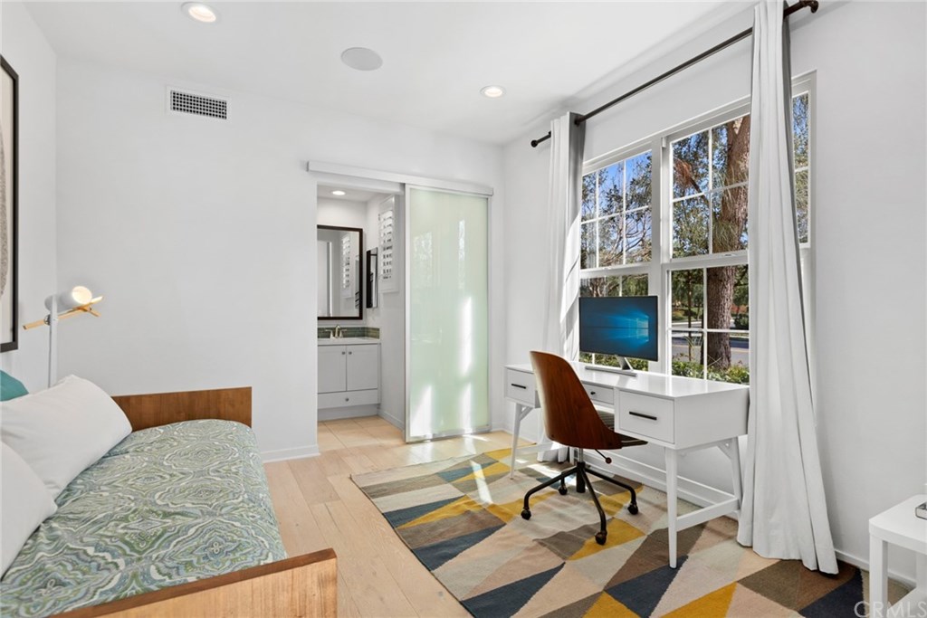 53 Kestrel Irvine, CA 92618 - Photo 11 of 39 Custom Barn Door compliments the space