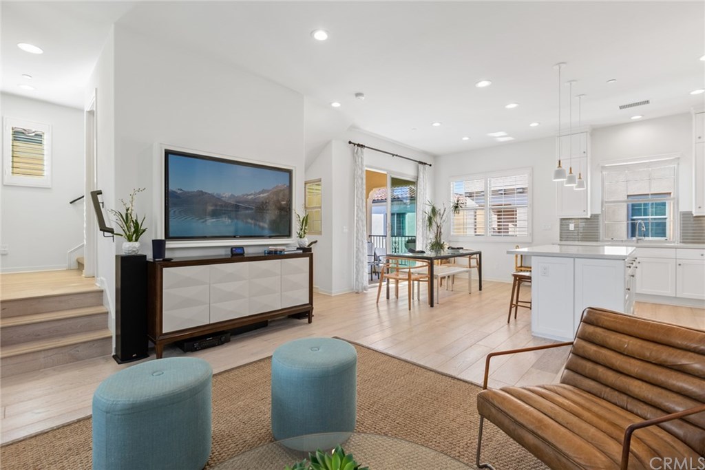 53 Kestrel Irvine, CA 92618 - Photo 39 of 39 As you glide through the house, beautiful flooring, posh finishes, recessed lighting, soaring ceilings & open floor plan will make you feel right at home